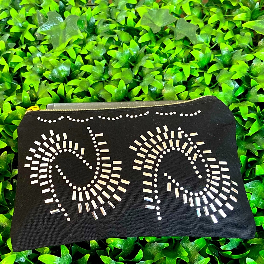 New small black clutch or bag insert for storage.